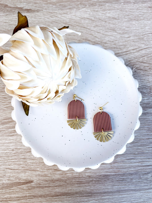 Gold and mocha mousse arch earring with brass sun