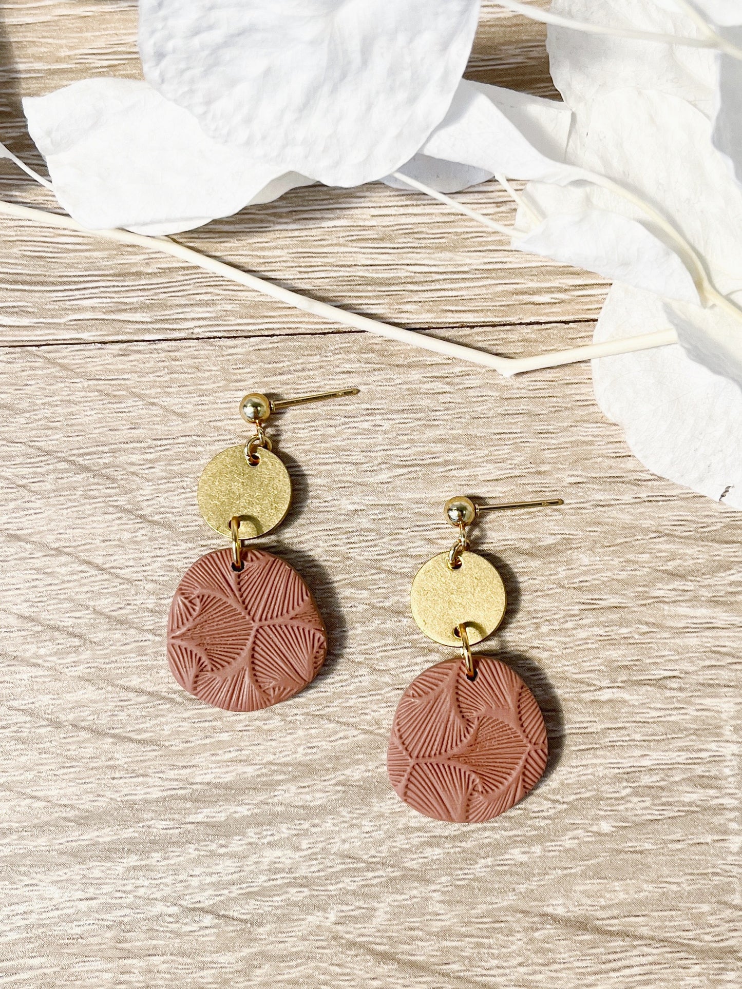 Gold stud earring with mocha mousse textured organic circle