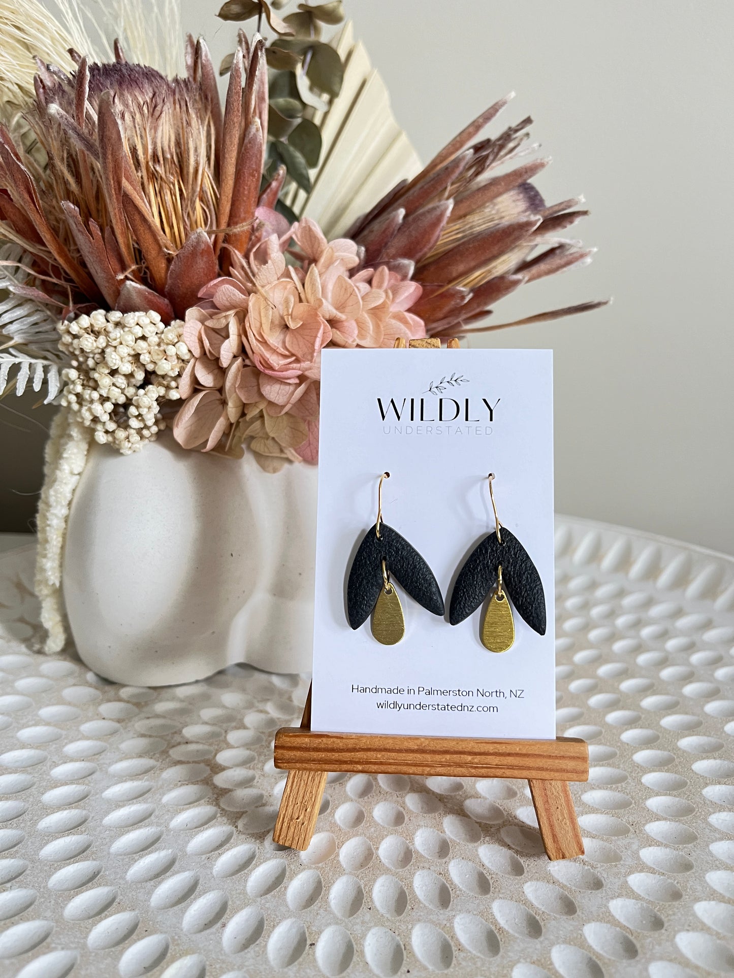 Black petal look clay earring with gold hook