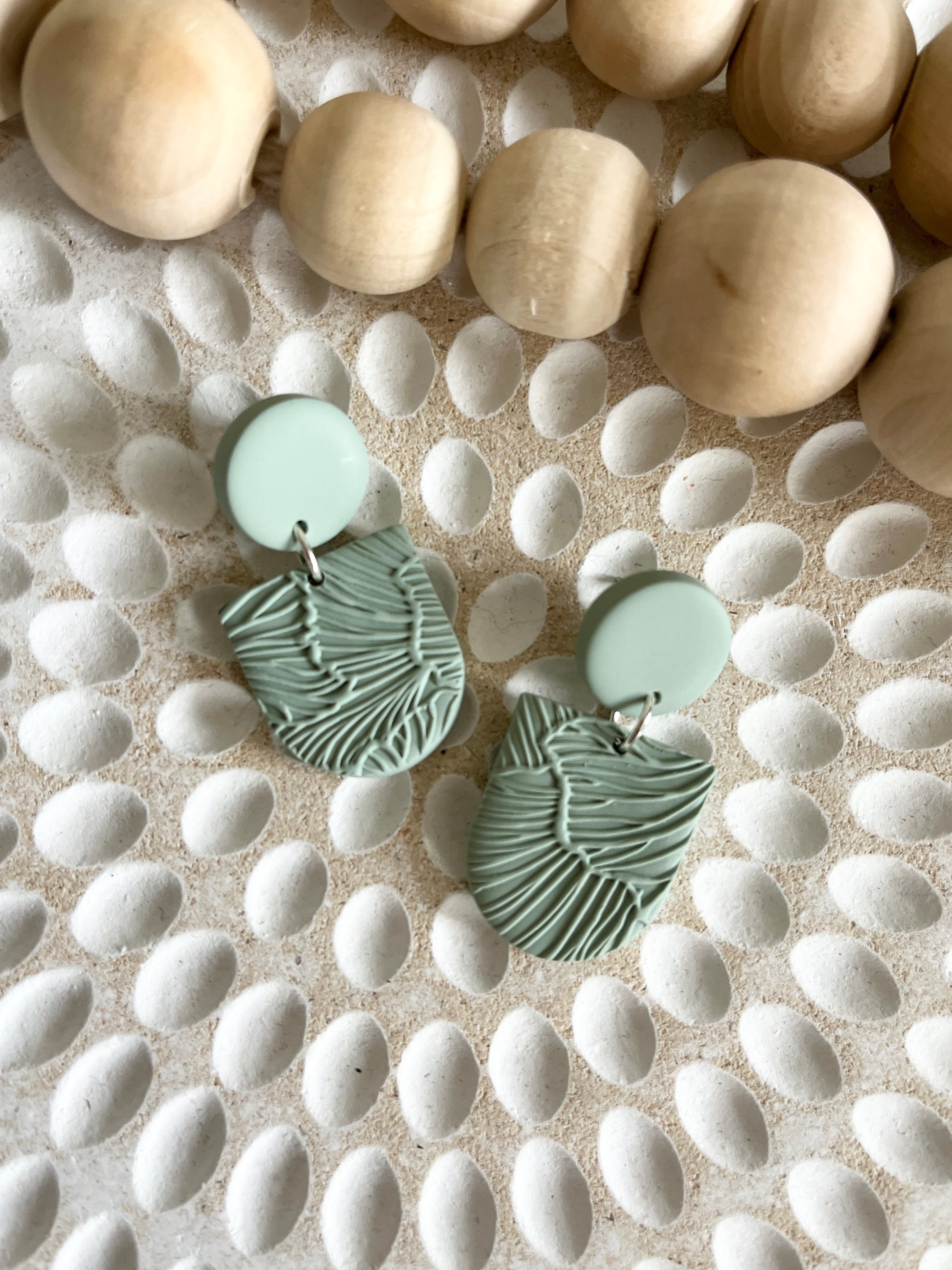 Sage floral texture inverted arch stud earring