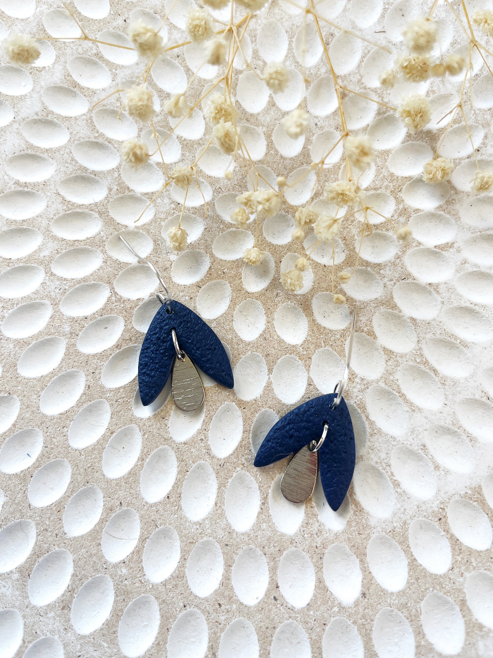 Navy petal look clay earring with silver hook