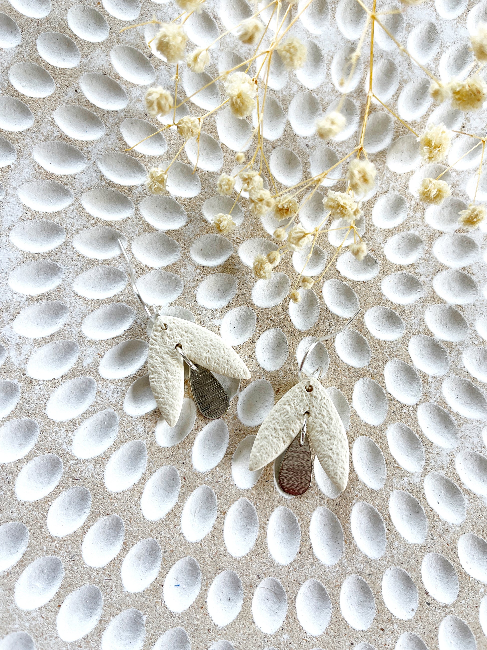 Cream petal look clay earring with silver hook